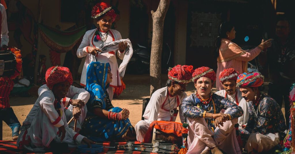 Capture of a vibrant group in traditional Rajasthani attire, showcasing cultural heritage in Udaipur, India.