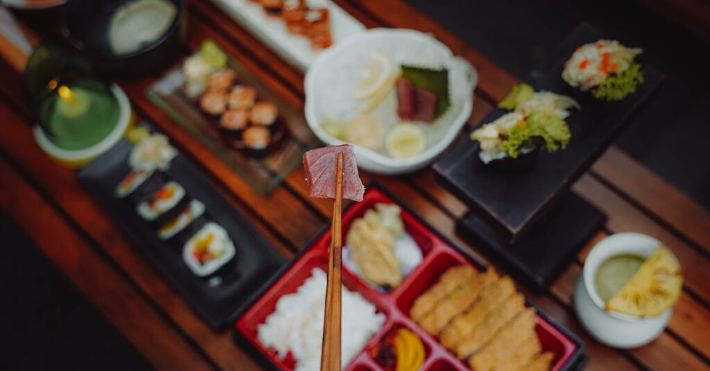 A close-up of various Japanese sushi dishes on a wooden table.