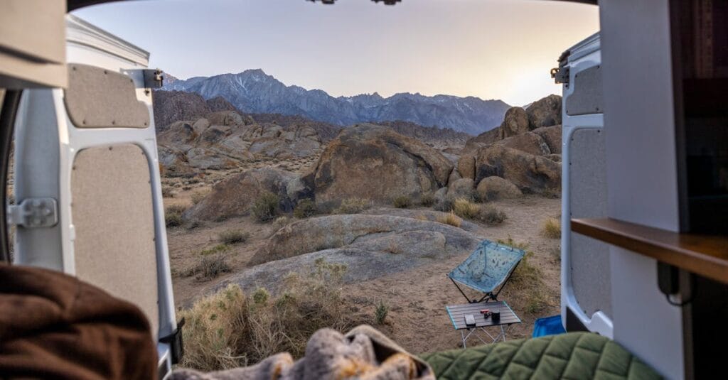 View from a van of a serene mountain landscape, perfect for adventure lovers.