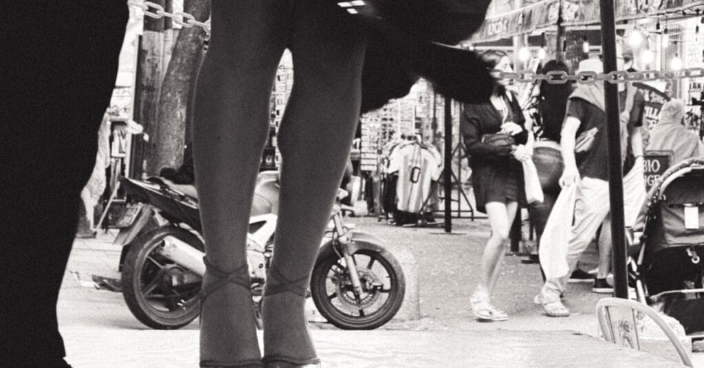 Dynamic street tango scene in Buenos Aires captures movement and urban life.