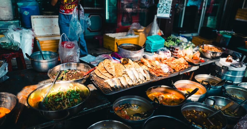 Authentic Thai street food market scene in Bangkok, showcasing diverse dishes.