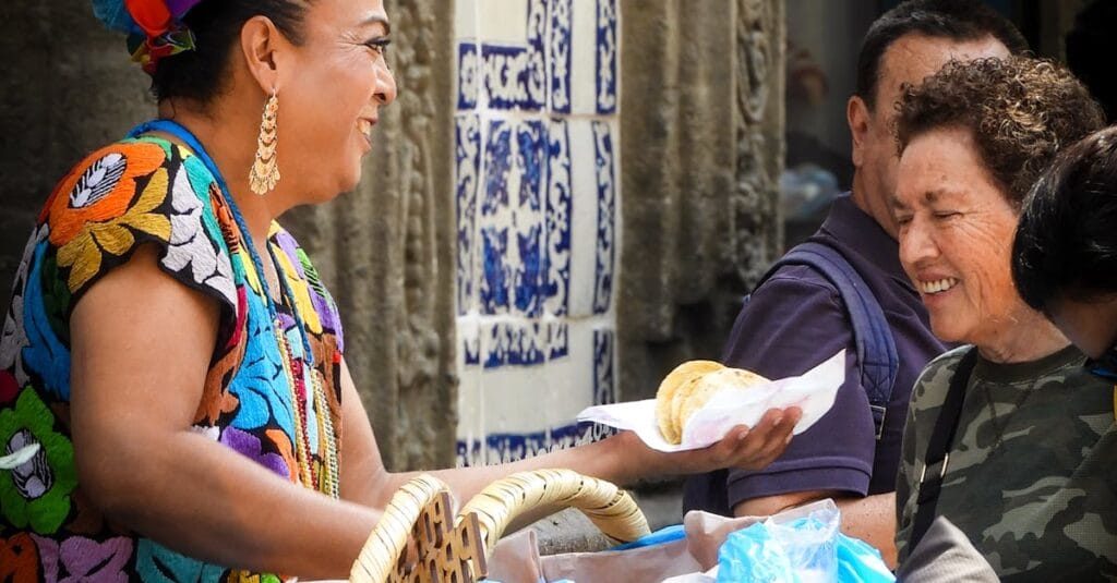 A vibrant street vendor in Mexico City selling traditional food, capturing the city's lively atmosphere.