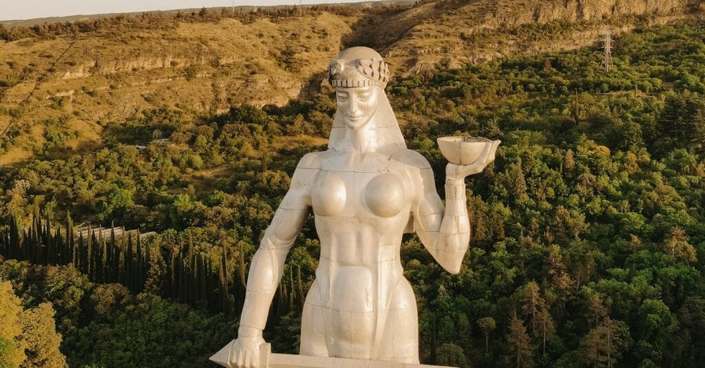 Aerial view of the iconic Mother of Georgia statue overlooking Tbilisi, Georgia.